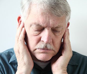 A man feeling Acoustic Neuroma Pressure-SL Hunter Speechworks